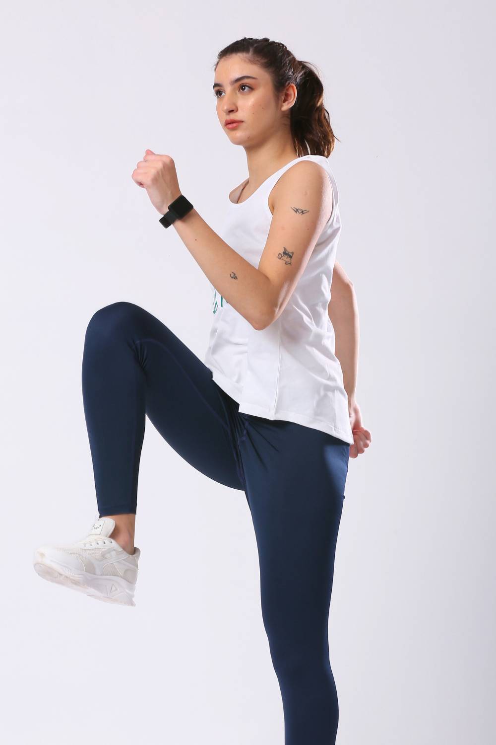 buy aguante women logn run singlet top #Color_White