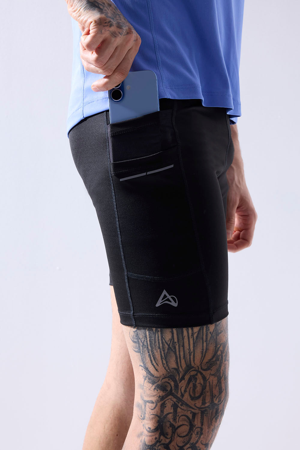 men running half tight with inner lining and multiple pockets #Color_Black