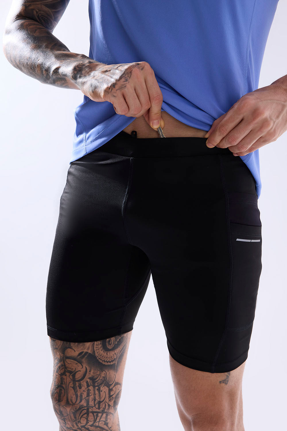 men running half tight with inner lining and multiple pockets #Color_Black