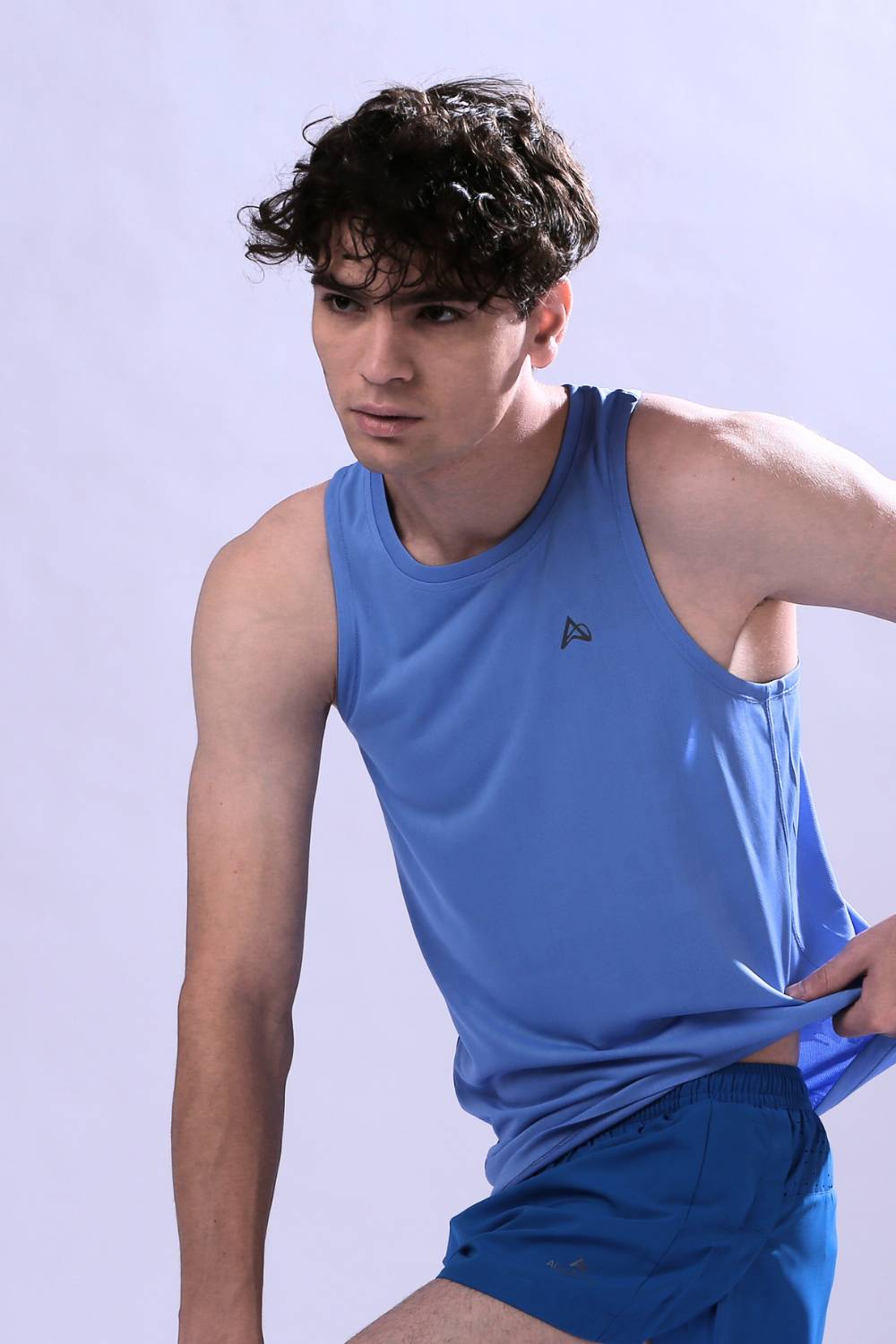 Aguante men’s running singlet – moisture-wicking athletic tank top #Color_Airy Blue