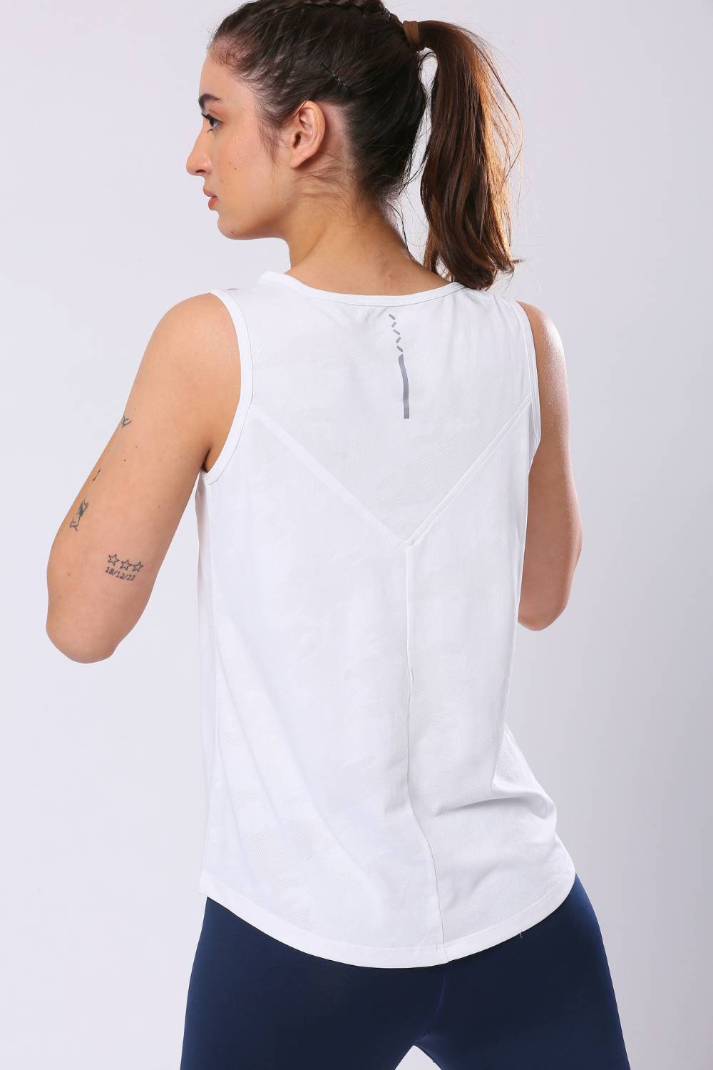 buy aguante women logn run singlet top #Color_White