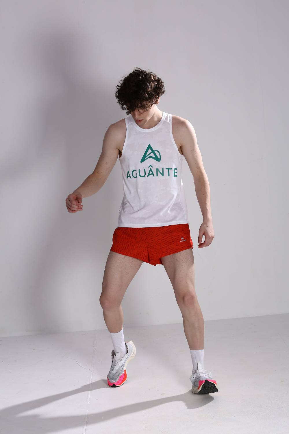 buy men aguante running singlet white online #Color_White